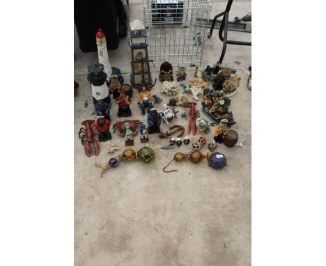 AN ASSORTMENT OF NAUTICAL RELATED ITEMS TO INCLUDE LIGHT HOUSES, SAILOR FIGURES AND ANIMALS ETC 