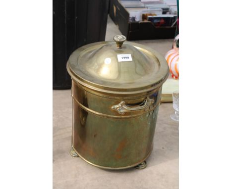 A VINTAGE BRASS LIDDED COAL BUCKET 