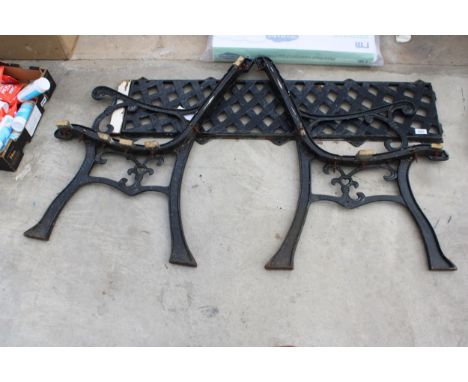 A PAIR OF CAST BENCH ENDS AND A CAST LATTICE BACK 