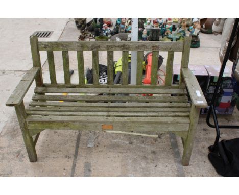 A WOODEN SLATTED GARDEN BENCH 