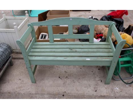 A WOODEN SLATTED GARDEN BENCH 