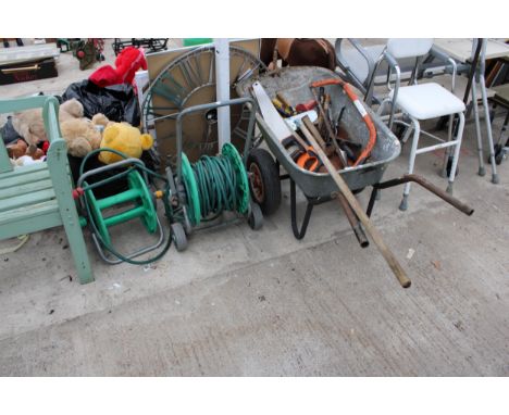 A WHEEL BARROW, AN ASSORTMENT OF TOOLS AND TWO HOSE REELS 