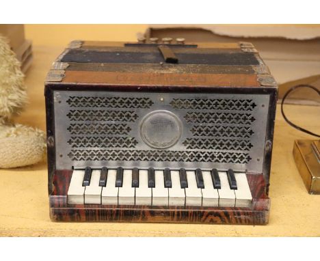 A VINTAGE PIANO-TONE ACCORDION 