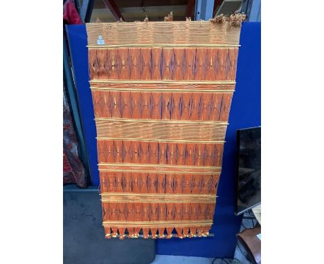 A VINTAGE ORANGE AND YELLOW WALL HANGING, 88CM X 170CM 