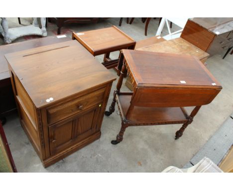 AN ERCOL BLONDE ELM BESIDE CABINET AND OAK TIER DROP-LEAF TROLLEY 