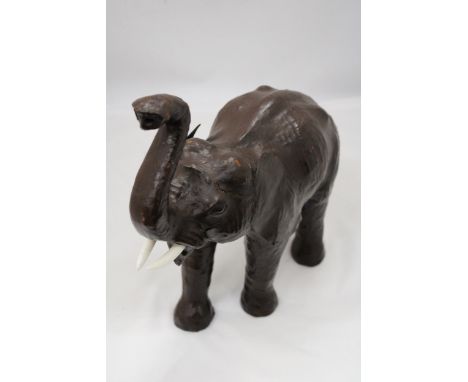 A VINTAGE LEATHER ELEPHANT, HEIGHT 35CM 