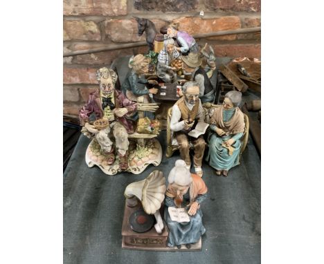 SIX CHALKWARE FIGURINES FEATURING A COUPLE PLAYING CARD GAMES, LADY WITH DONKEY AND CART ETC 