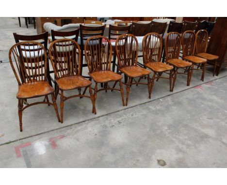 A SET OF EIGHT ELM R.W.F.CO WINDSOR STYLE DINING CHAIRS WITH STICK BACKS AND CRINOLINE BOWS 