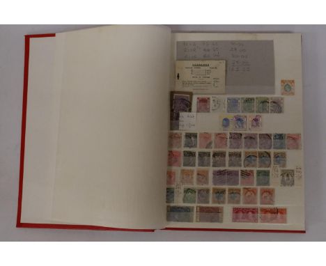 THE RED COMPASS STOCKBOOK HOUSING AN ECLECTIC COLLECTION OF GB AND BRITISH COMMONWEALTH MINT AND USED STAMPS. VALUE LIES IN T
