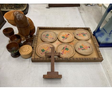 A QUANTITY OF VINTAGE TREEN TO INCLUDE A TRAY WITH CANADIAN COASTERS, EGG CUPSAND WOODEN EGGS, A CRUCIFIX, ETC 