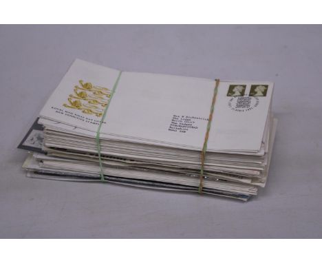 A COLLECTION OF FIRST DAY COVERS AND UNUSED COMMERMORATIVE STAMPS 
