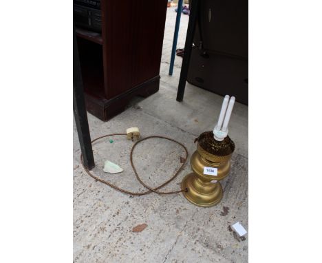 A VINTAGE BRASS OIL LAMP CONVERTED TO ELECTRIC 