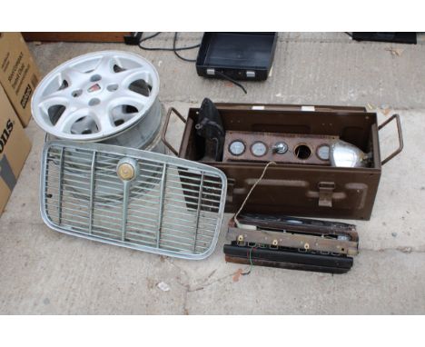 A PAIR OF ROVER ALLOY WHEELS, A VINTAGE JAGUAR RADIATOR GRILL, LUCAS LAMP AND CAR INSTRUMENTS 