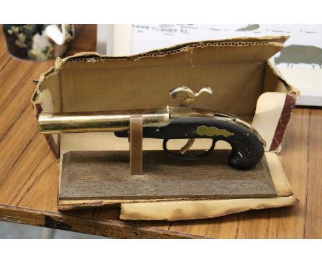 A DERRINGER GUN TABLE LIGHTER WITH STAND 