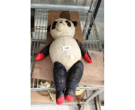 A VINTAGE PANDA TEDDY BEAR 
