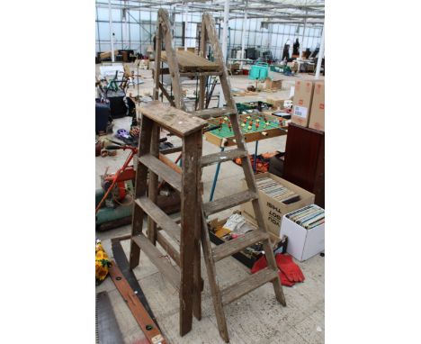 TWO VINTAGE WOODEN STEP LADDERS TO INCLUDE A FIVE RUNG AND A THREE RUNG 