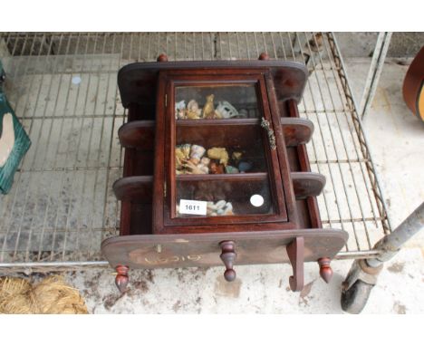 A VINTAGE WOODEN DISPLAY CABINET AND AN ASSORTMENT OF WADE FIGURES