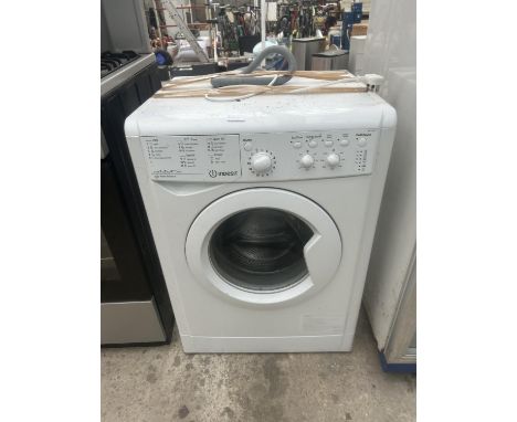 AN INDESIT AUTOMATIC WASHING MACHINE (IWC.71252) 