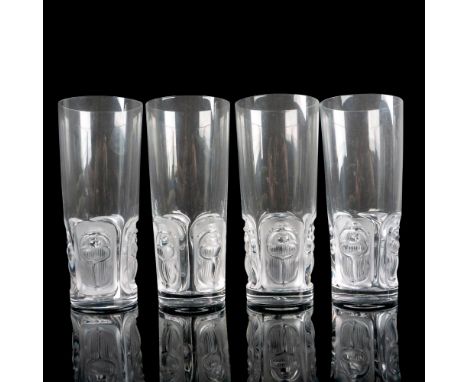 A set of 4 clear drinkware with frosted raised Egyptian scarabs. Lalique France etched on base. Dimensions: 2.75"W x 6.25"HMa