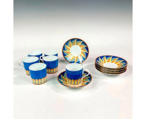 Discontinued pattern. Elegant and lightweight white porcelain demitasse cup and saucer set. Design features a cerulean blue g
