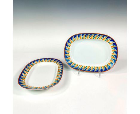 Discontinued pattern. Elegant and lightweight porcelain pickle dishes with rounded rectangular shapes. Design features cerule
