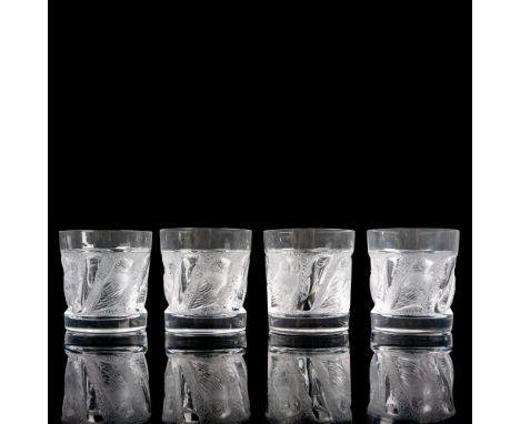 A set of 4 clear and frosted drinkware adorned with raised owls. Lalique France etched on base. Dimensions: 3"W x 3.25"HManuf