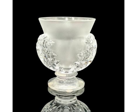 A beautiful small frosted vase adorned with clear acanthus leaves on the sides and clear footed base. R. Lalique acid mark on