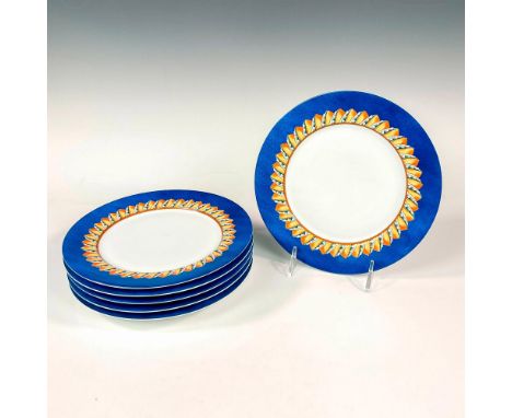 Discontinued pattern. Elegant white porcelain salad plate set. Design features cerulean blue rims with abstract geometric yel