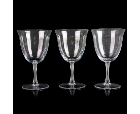 Clear flared glass with frosted stem. Lalique etched mark. Dimensions: 4"L x 4"W x 6"HManufacturer: LaliqueCountry of Origin: