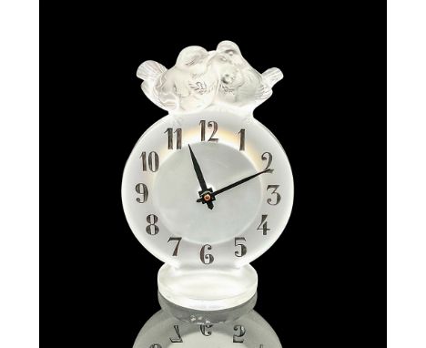 Original created as a teaching clock. A satin finish table clock with black enamel numbers and birds perched on the top. Lali