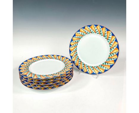 Discontinued pattern. Elegant and lightweight white porcelain dinner plate set. Design features cerulean blue rims with abstr