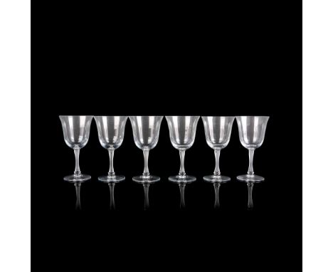 Clear flared glass with frosted stem. Lalique etched mark. Dimensions: 3"L x 3"W x 5.75"HManufacturer: LaliqueCountry of Orig