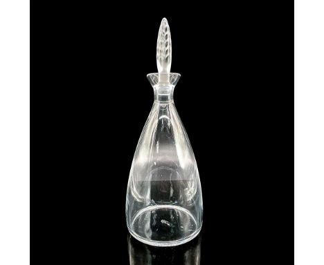 Clear crystal decanter with frosted engraved stopper. Lalique France etched mark. Dimensions: 4.5"W x 12.5"HManufacturer: Lal