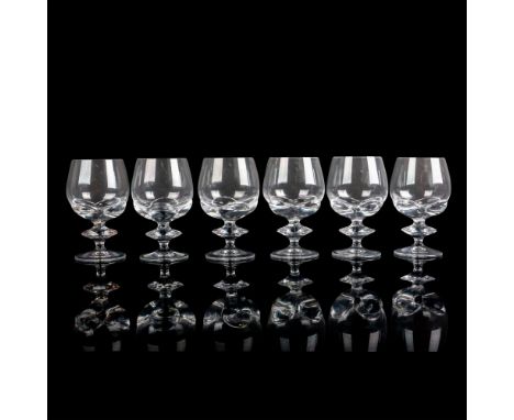 A set of 6 clear drinkware with a floral wafer stem. Lalique France etched on base. Issued: c. 1981-1996Dimensions: 4"W x 6"H