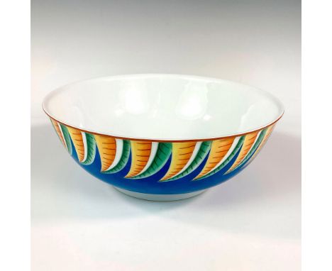 A large salad serving bowl. Blue exterior with yellow and green leaf motif. Lalique backstamp. Issued: c. 1993-1997Dimensions