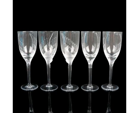 Crystal glasses with frosted angel faces and acid etched wings. Lalique mark on bottoms. Manufacturer: LaliqueCountry of Orig