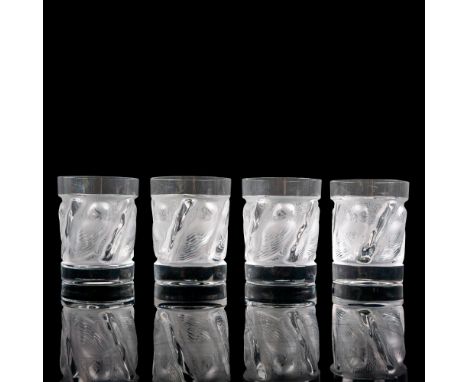 A set of 4 clear and frosted drinkware adorned with raised owls. Lalique France etched on base. Dimensions: 3"W x 4"HManufact