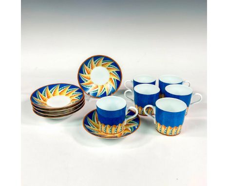 Discontinued pattern. Elegant and lightweight white porcelain demitasse cup and saucer set. Design features a cerulean blue g