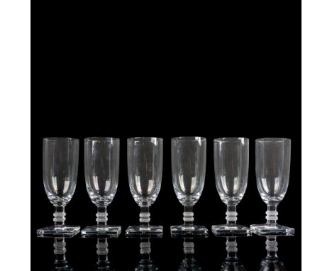 A set of 6 clear drinkware with a square stem adorned with zigzag pattern. Lalique France etched on base. Issued: c. 1939-202