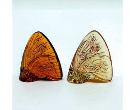Gilt-highlighted Champagne and Amber butterflies with embossed enamel designs on the wings. Lalique signature etched on the b