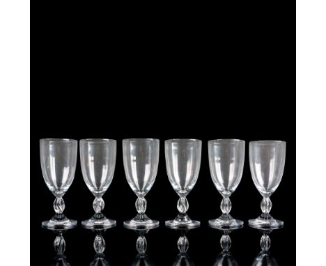 Clear glass with twisted stem. Lalique etched mark. Dimensions: 2.5"L x 2.5"W x 6"HManufacturer: LaliqueCountry of Origin: Fr