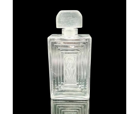 A clear bottle with reliefs of nude dancers on frosted center panel on both the front and back. Includes frosted stopper. Lal