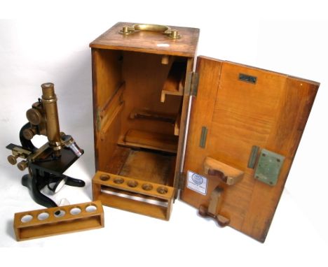 A Leitz Wetzlar microscope with mechanical stage.