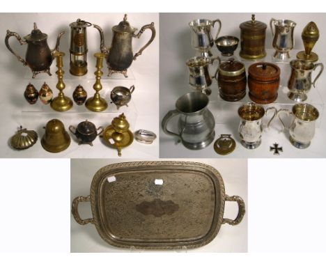 A quantity of metalware to include brass candlesticks, a miner's lamp and a silver plated tea service etc. 