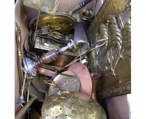 A quantity of brass ware to include a companion set, horse brasses, bed warmer and fire screen etc.