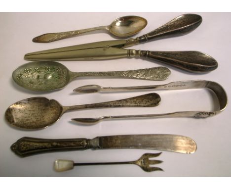 A pair of Victorian hallmarked silver sugar tongs, hallmarked for Exeter, a boxed sterling silver teaspoon, an Elizabeth II h