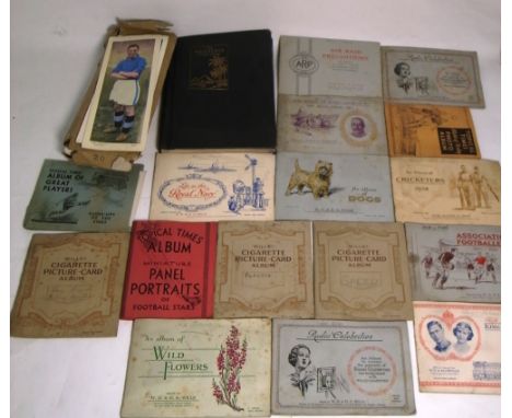 A good quantity of cigarette cards to include sporting and film star examples, some in books and some loose and a further fra