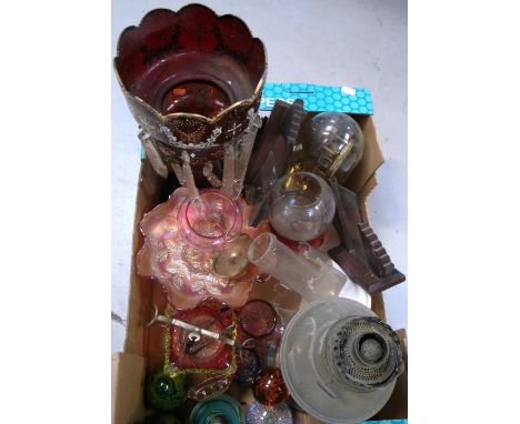 A Victorian cranberry glass lustre, further glassware to include carnival glass and paperweights, a brass oil lamp, a reprodu