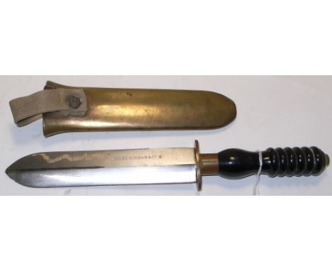 SIEBE GORMAN & CO; a c.1900 diver's knife with heavy brass scabbard and ribbed handle, signed to blade, length 34cm.
