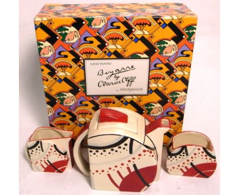 A boxed Wedgwood tea service based upon Clarice Cliff's Bizarre range, limited edition no.64/250 with original certificate. C